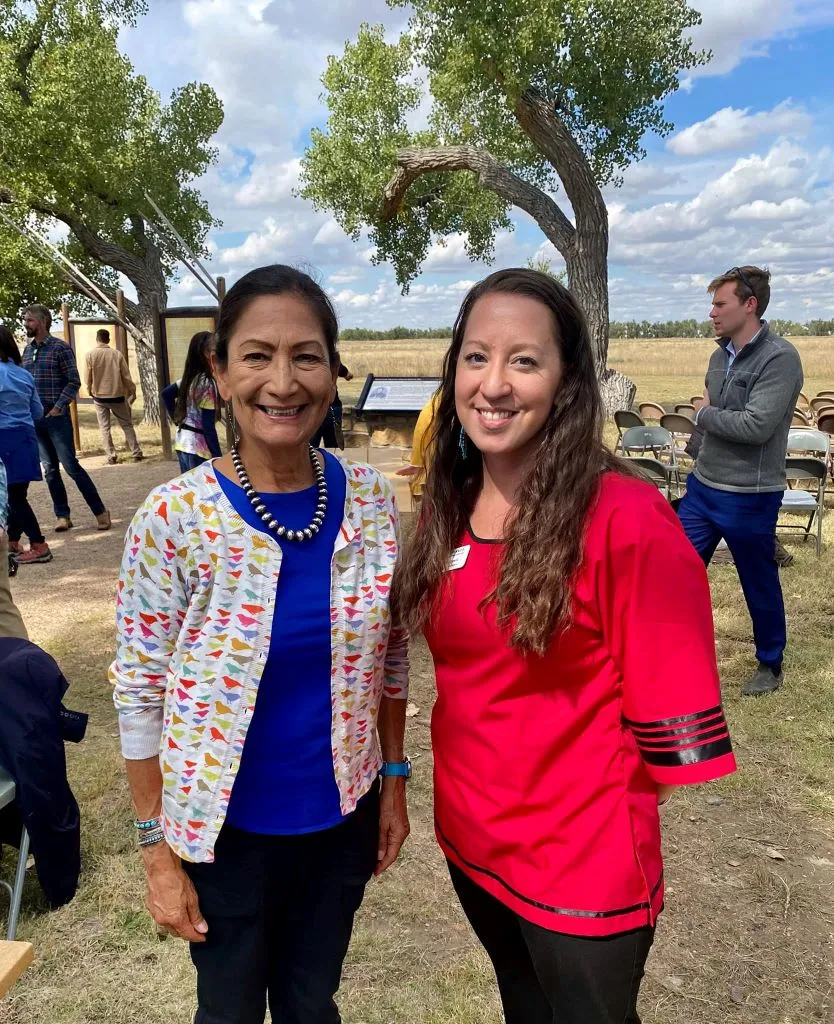 Anthropology graduate Jenifer Lewis poses with Secretary of the Interior Deb Haaland